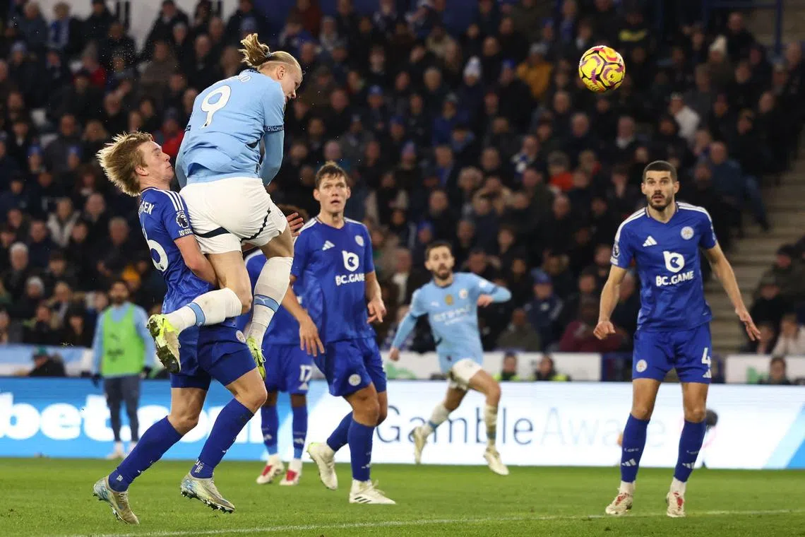 Erling Haaland heading home Manchester City's second goal in their 2-0 English Premier League win over Leicester City at the King Power on Dec 29.