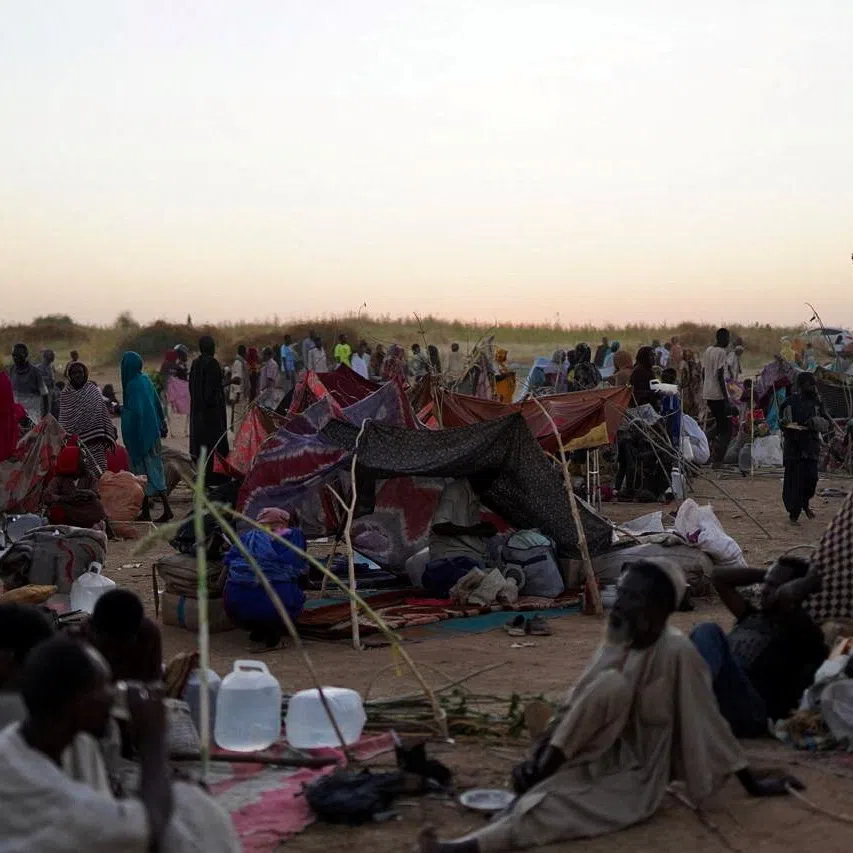 A general view of people sitting at a camp for displaced families who fled from al-Fashir to Tawila, North Darfur, Sudan, October 27, 2025. REUTERS/Mohammed Jamal