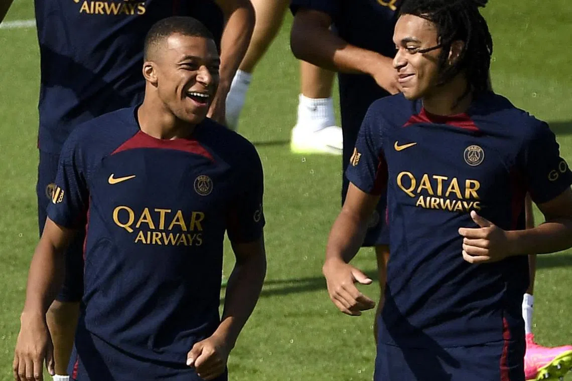 Paris Saint-Germain forward Kylian Mbappe (left) seen training with his younger brother Ethan, ahead of the club's Japan tour.