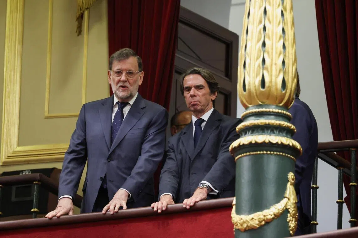 Former Prime Ministers of Spain, Mariano Rajoy and Jose Maria Aznar Lopez, on the day of a meeting between Pope Leo XIV and the members of the Spanish Parliament, during Pope Leo's apostolic journey in Madrid, Spain, June 8, 2026. REUTERS/Alejandro Martinez Velez