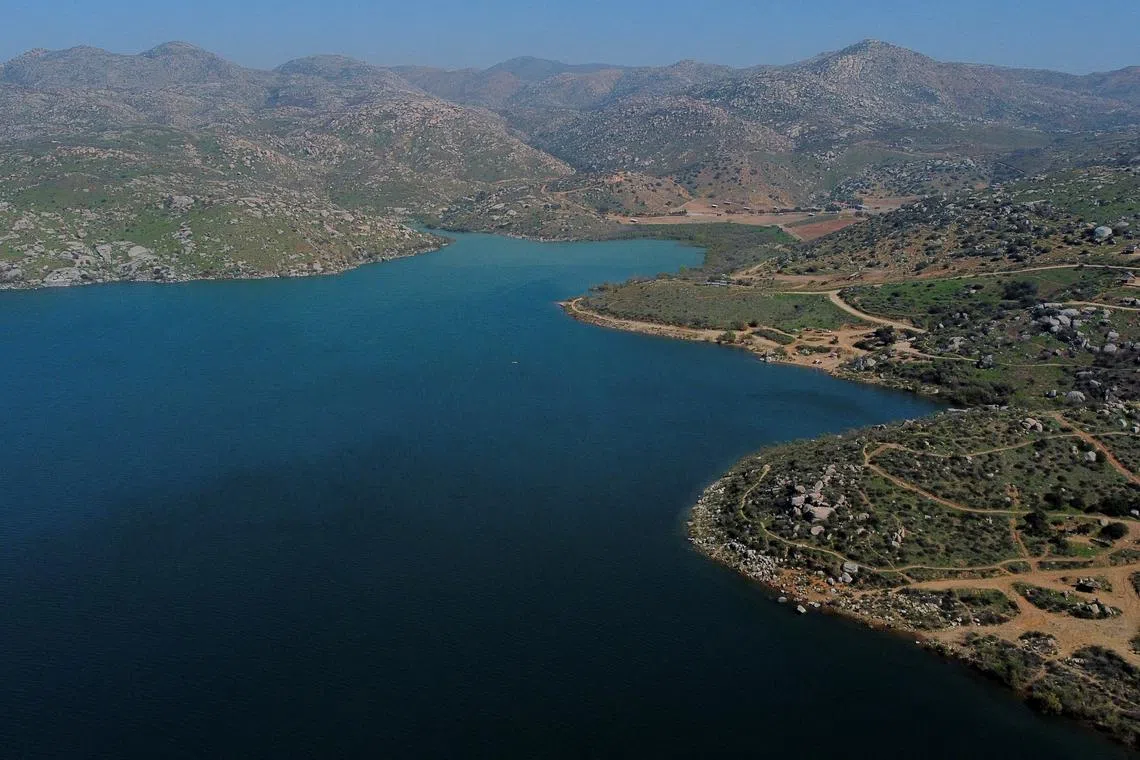 A drone view of El Carrizo dam, after the U.S. announced it will deny for the first time a request by Mexico to send water through a special delivery channel from the Colorado River to Tijuana, due to shortfalls in Mexico's water deliveries under the water sharing treaty signed in 1944 by both nations, in Tecate, Mexico, March 21, 2025. REUTERS/Jorge Duenes