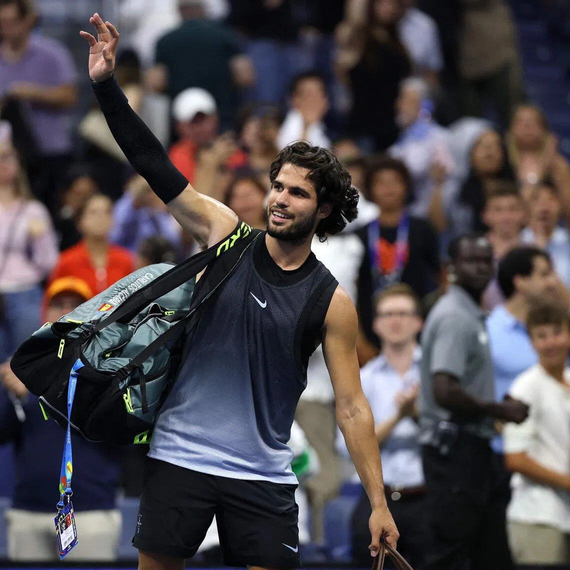 Carlos Alcaraz of Spain waving to the crowd as he exits the US Open on Sept 8 after losing to Ben Shelton. Their match ended at 3:33am local time.