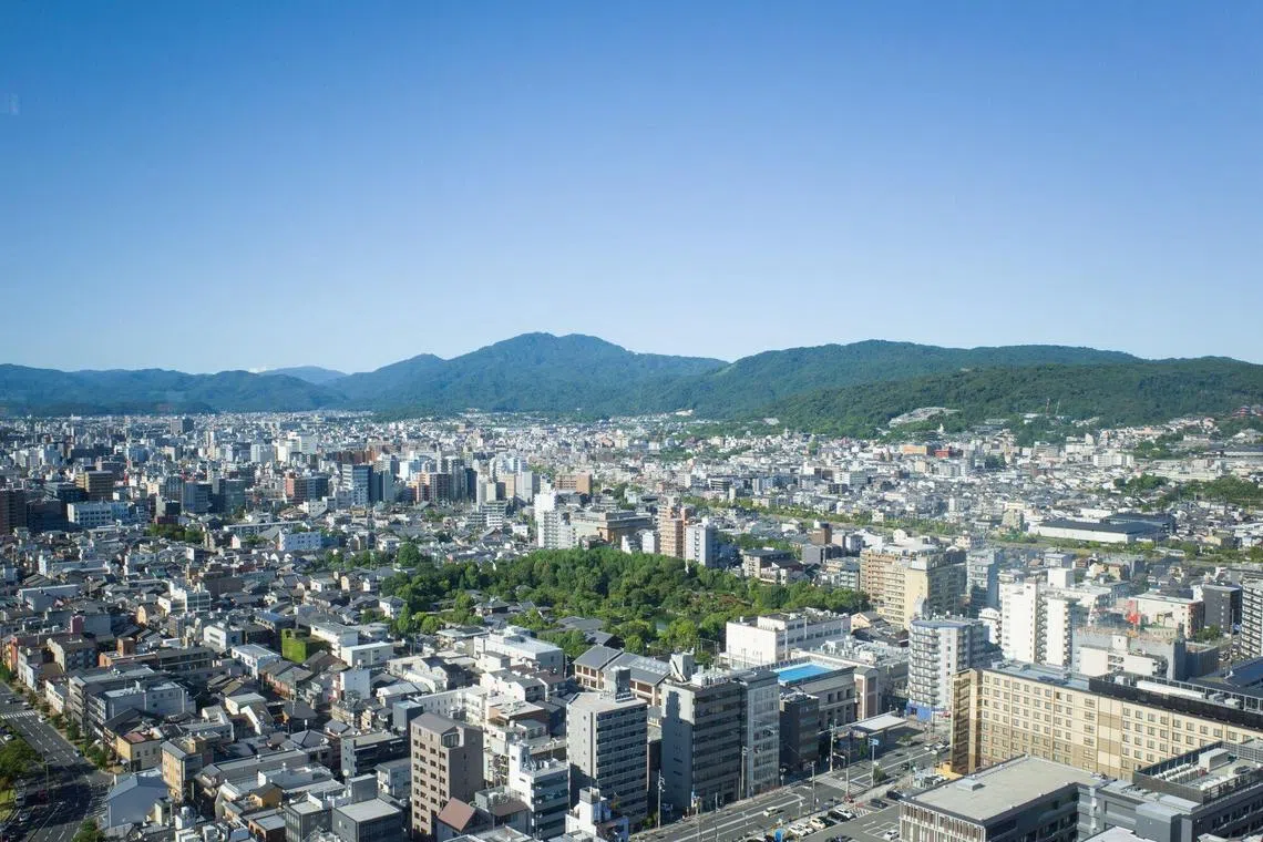 Commercial and residential buildings in Kyoto, Japan, on Friday, Aug. 11, 2023. Japan is scheduled to release its second-quarter gross domestic product (GDP) figures on Aug. 15. Photographer: Kentaro Takahashi/Bloomberg