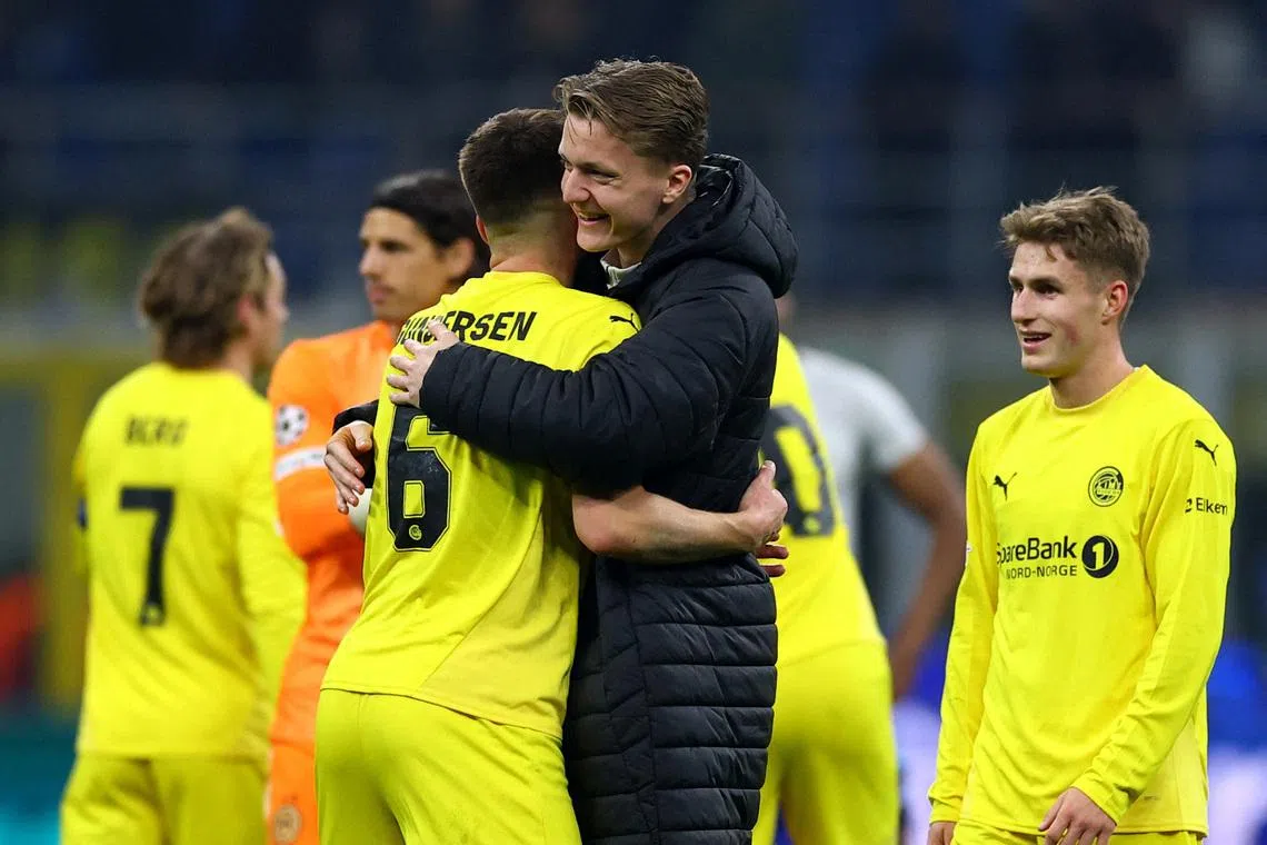 Soccer Football - UEFA Champions League - Play Off - Second Leg - Inter Milan v Bodo/Glimt - San Siro, Milan, Italy - February 24, 2026 Bodo/Glimt's Jostein Gundersen celebrates after the match REUTERS/Claudia Greco