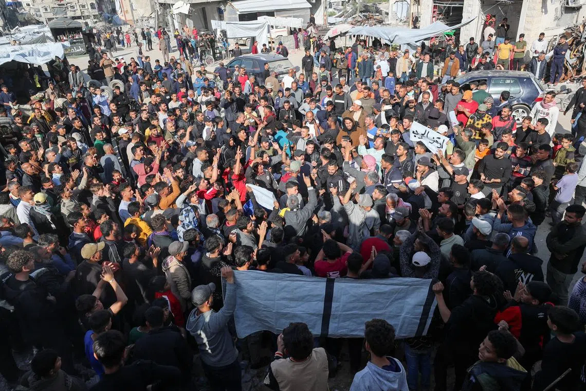 Palestinians protest to demand an end to war, chanting anti-Hamas slogans, in Beit Lahiya in the northern Gaza Strip March 26, 2025. REUTERS/Stringer/File Photo