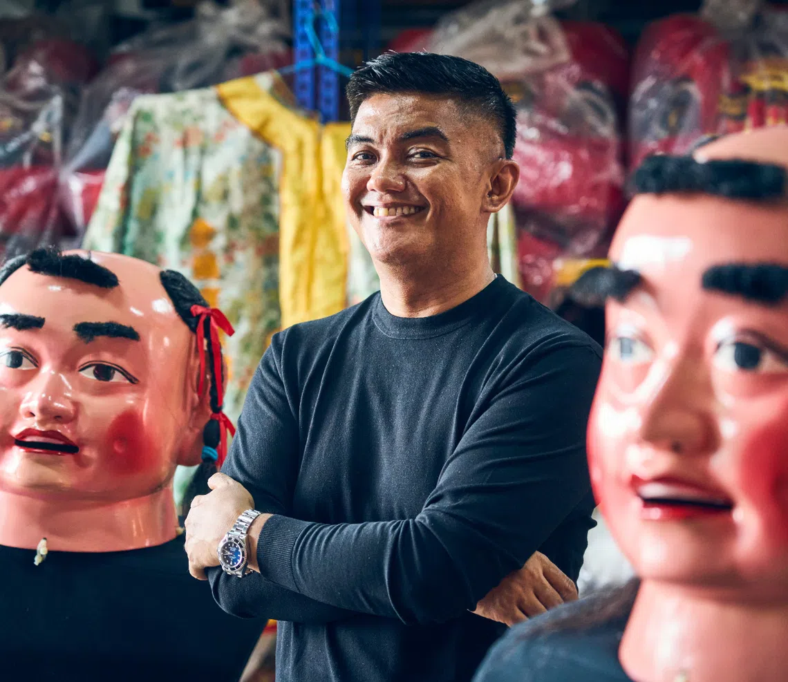 st-180-your-singapore-story-ahmad-zahid-isnin-big-head-doll-performer