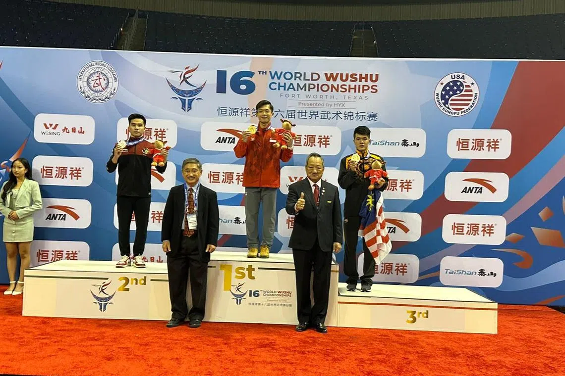 dlwushu20 - Singapore's Jowen Lim wins the men's gunshu gold at the World Wushu Championships, while Indonesia's Seraf Siregar and Malaysia's Clement Ting take silver and bronze respectively




Credit: Courtesy of Valerie Wee