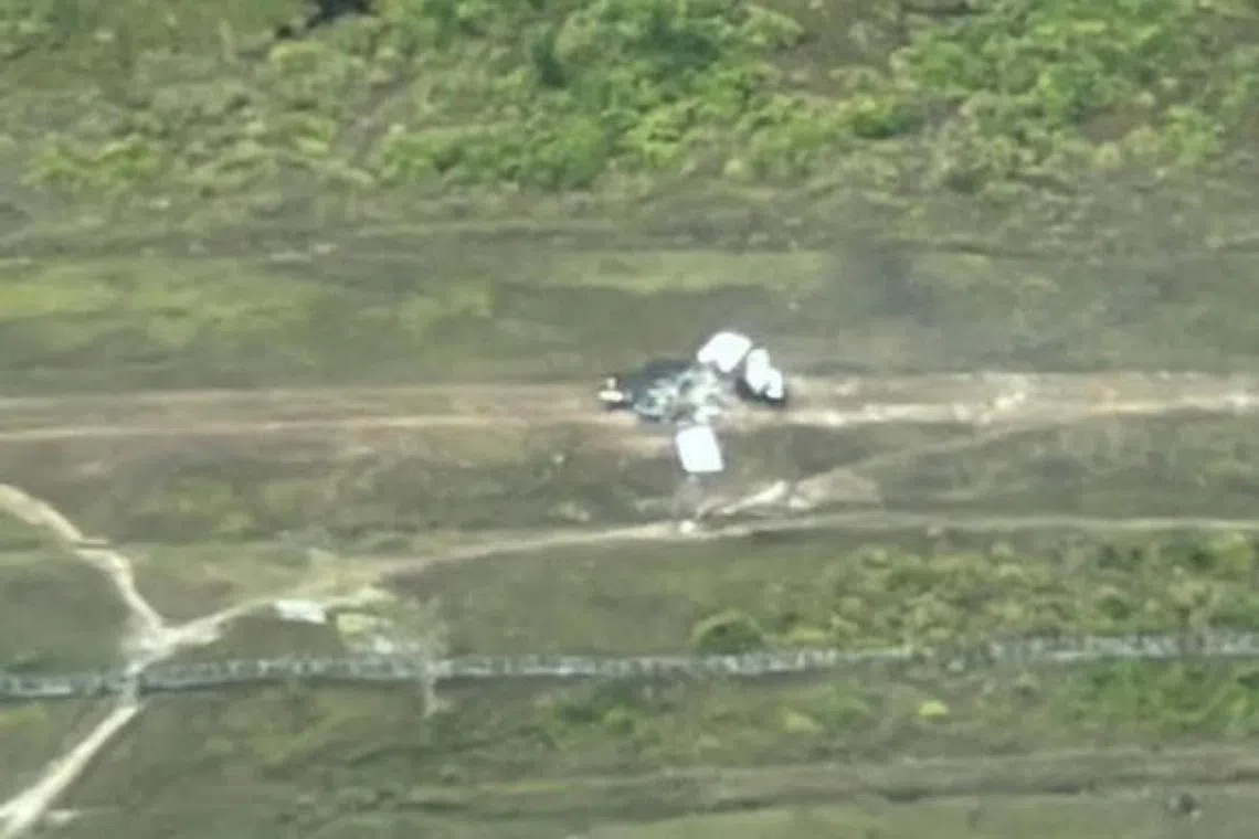 Separatist fighters took the pilot hostage after setting a small commercial plane on fire when it landed in a remote highland area.