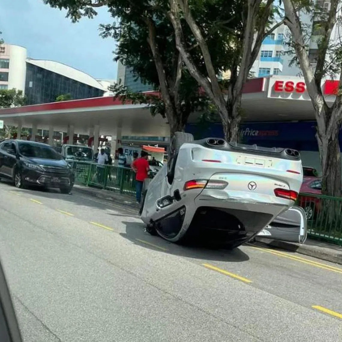 A Mercedes E300 AMG speeding at lane one on McPherson Road crashes and overturns on Feb 18 afternoon.