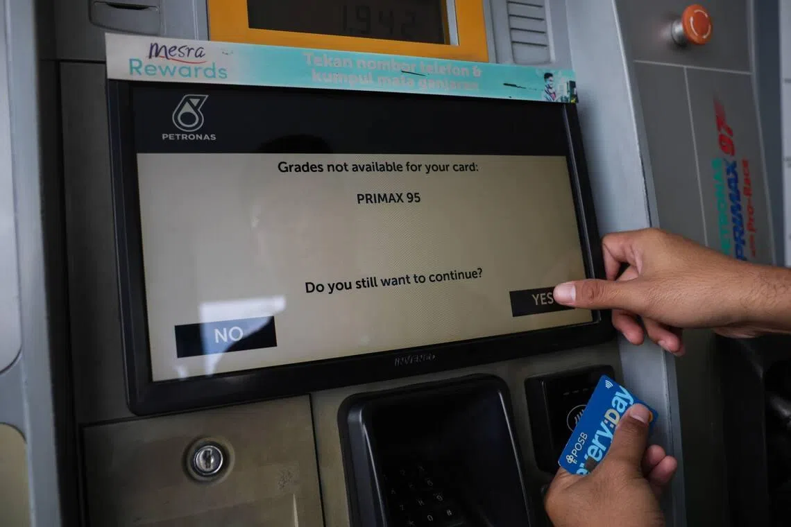 A petrol pump screen displaying “Grades not available for your card” at a Petronas station in Johor Bahru on April 1.