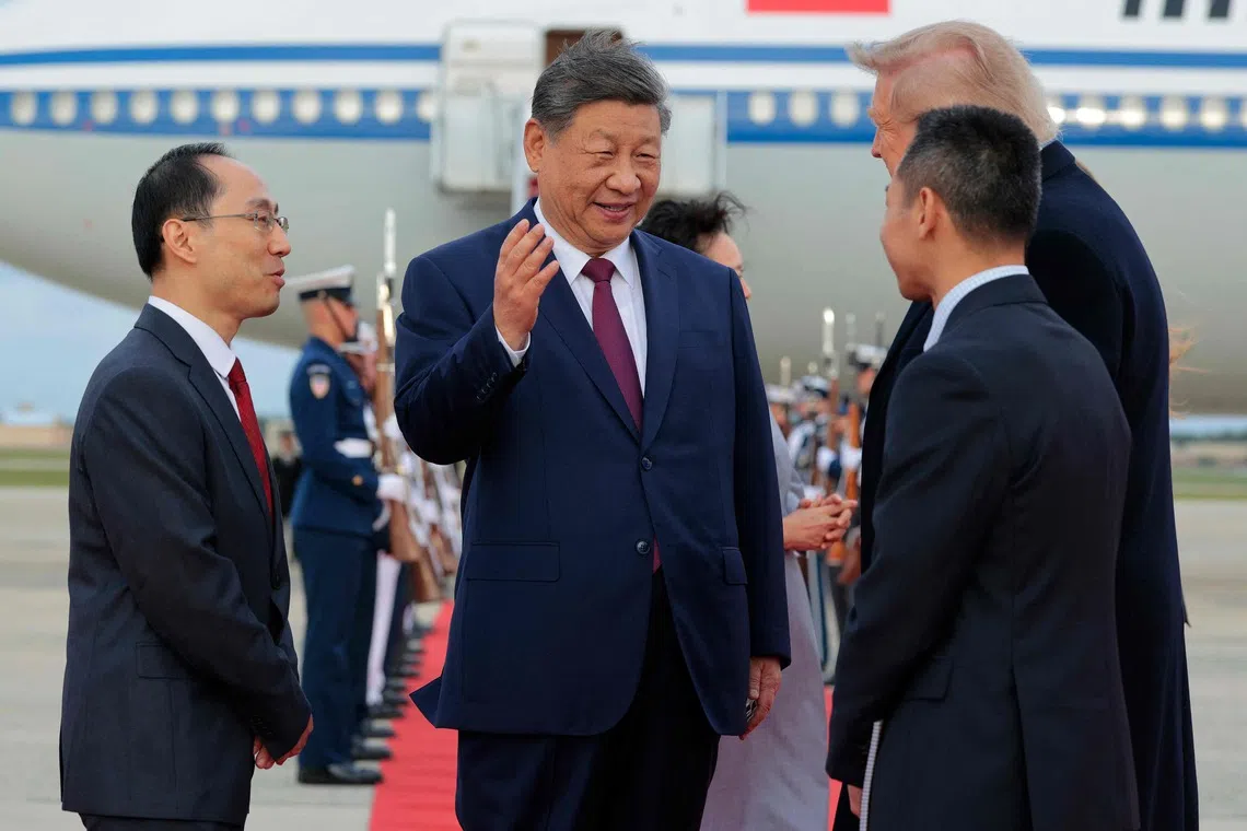 Chinese President Xi Jinping speaking with US President Donald Trump after arriving at Joint Base Andrews in Maryland on Sept 23.