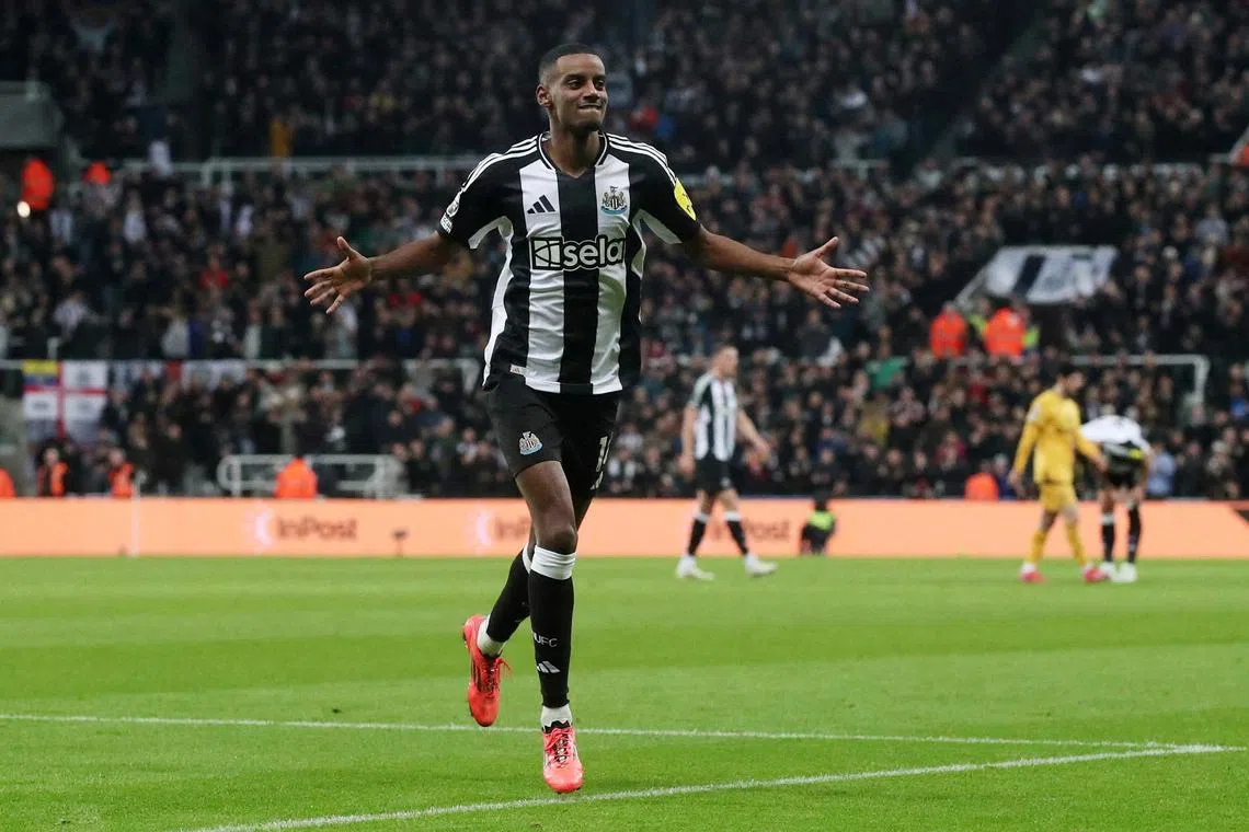 Newcastle United's Alexander Isak celebrates scoring their first goal.