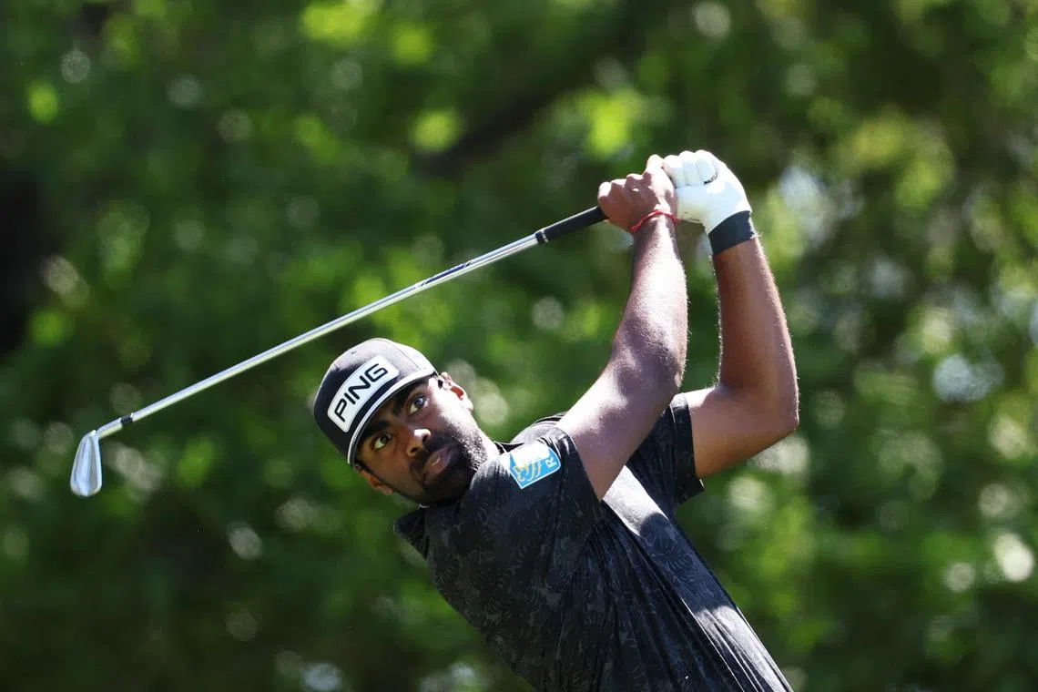 FILE PHOTO: Golf - The Masters - Augusta National Golf Club, Augusta, Georgia, U.S. - April 12, 2024 Sahith Theegala of the U.S. hits his tee shot on the 4th hole during the second round REUTERS/Mike Segar/File Photo