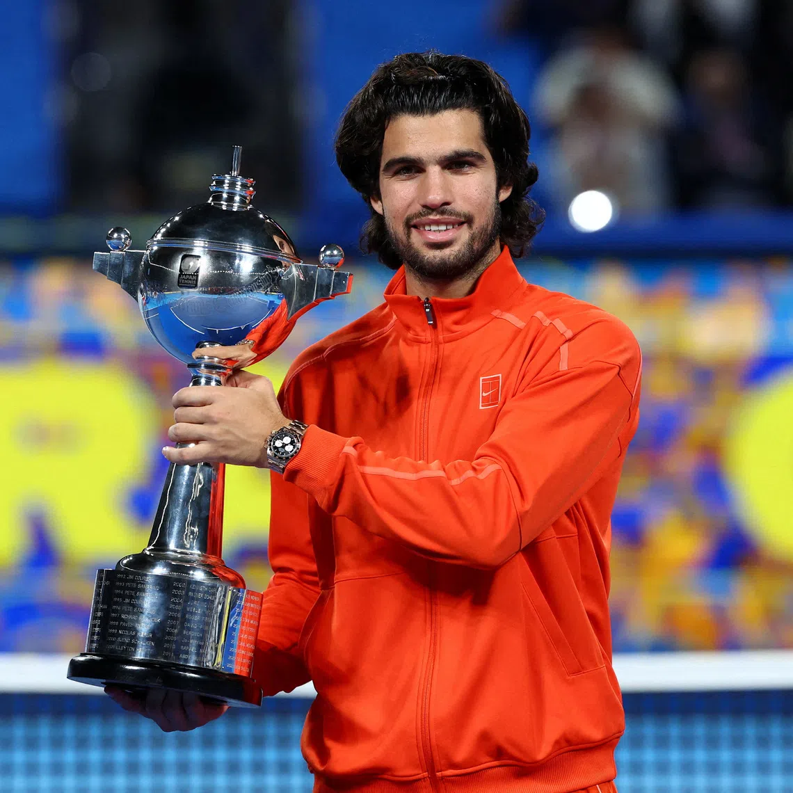 Tennis - ATP 500 - Japan Open - Ariake Coliseum, Tokyo, Japan - October 6, 2026 Spain's Carlos Alcaraz celebrates with the trophy after winning the final against Czech Republic's Jiri Lehecka REUTERS/Manami Yamada