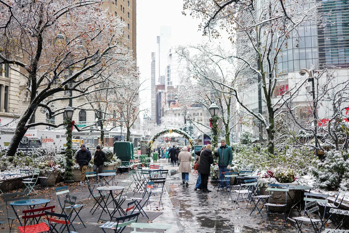 More than 560 flights across US grounded as snowstorm blankets New York City