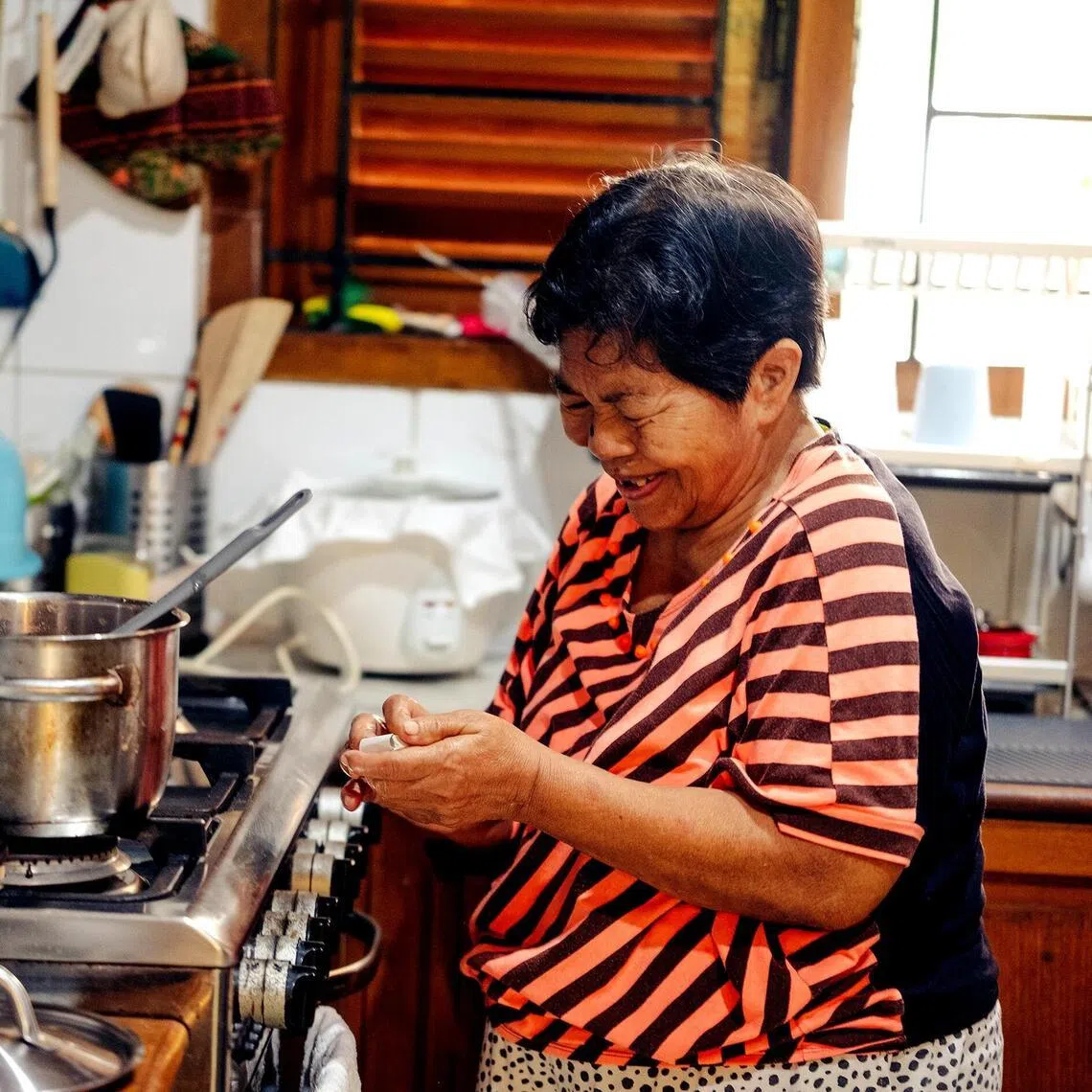 ktmaid - Ms Pani, a live-in domestic worker, working at her employer's home in South Tangerang, just outside Jakarta.