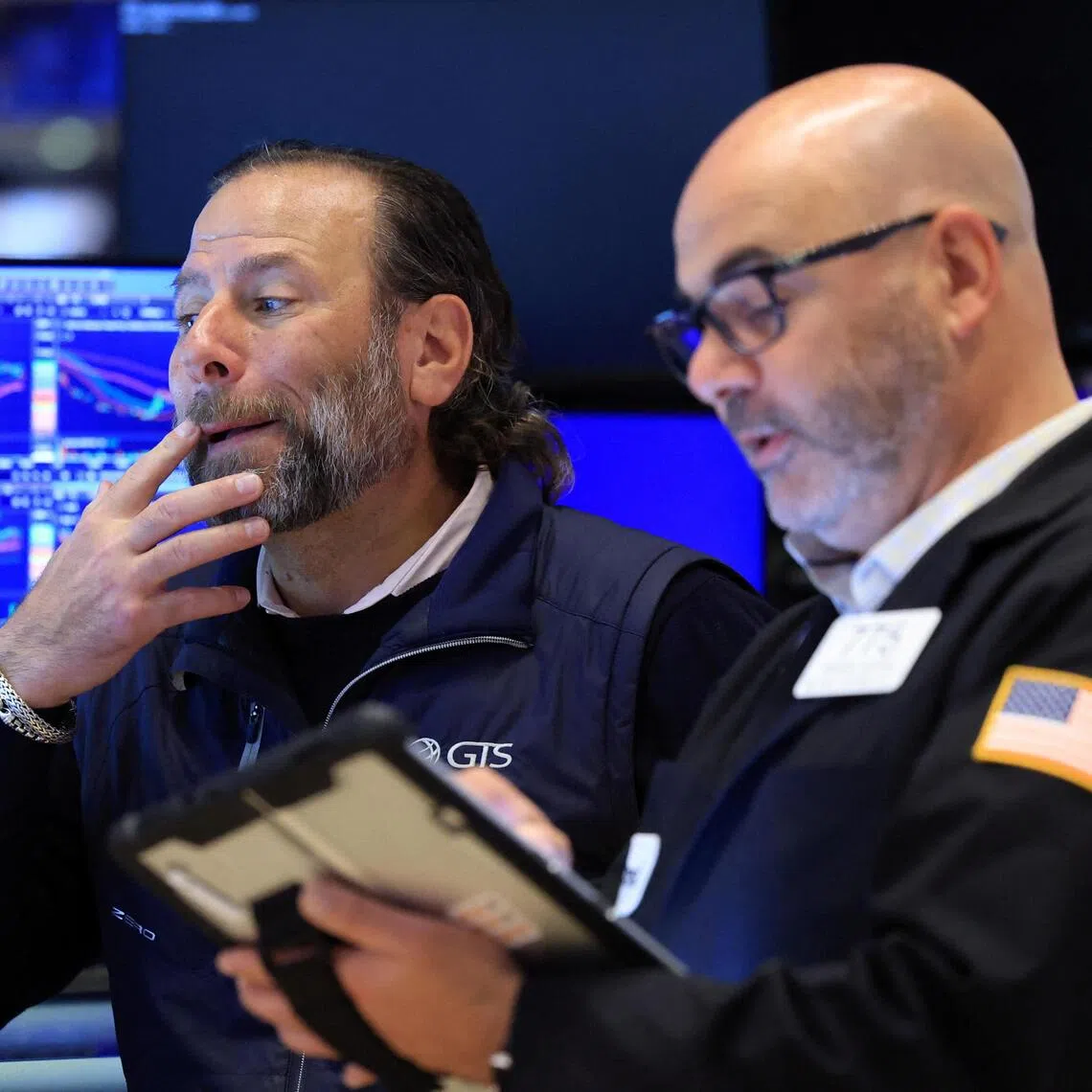 Traders working on the floor of the New York Stock Exchange in New York City, on Sept 25.