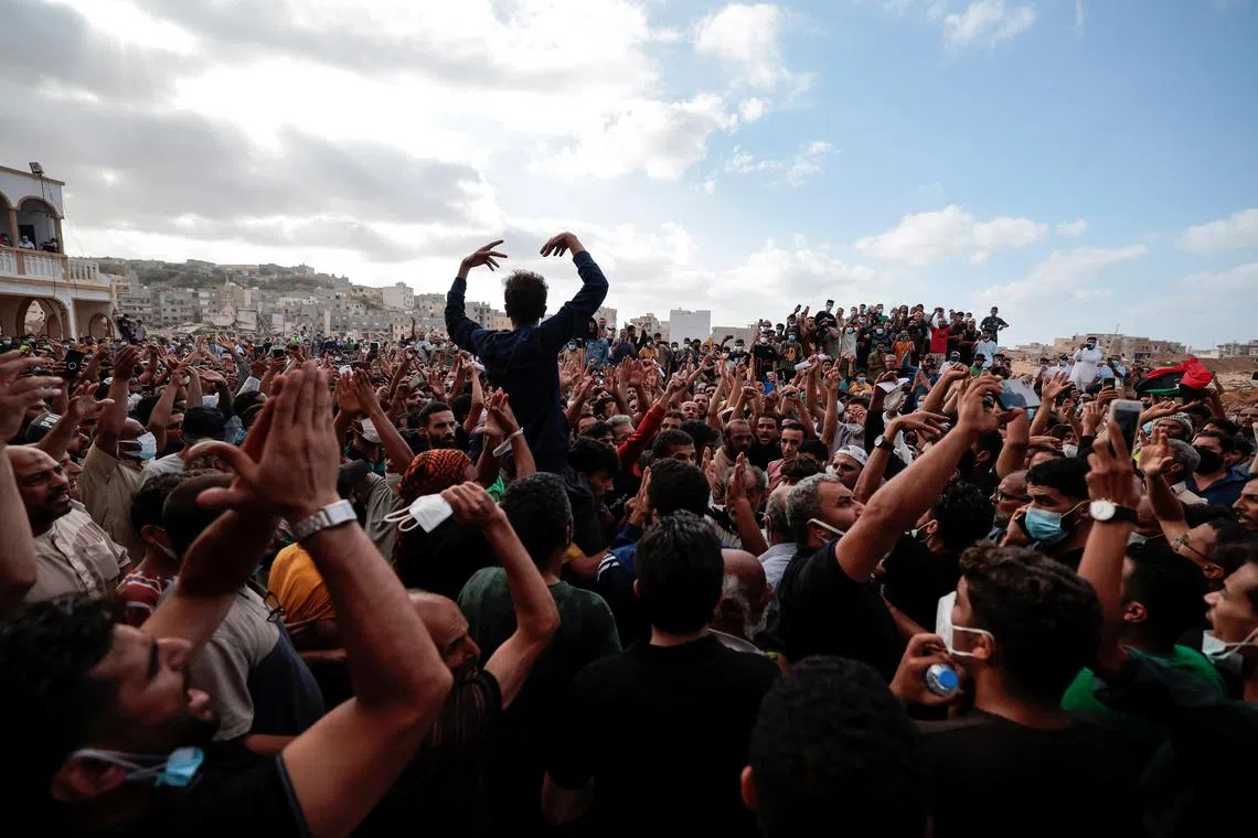 People who survived the deadly storm that hit Libya, protest outside the Al Sahaba mosque against the government in Derna, Libya September 18, 2023. REUTERS/Zohra Bensemra   