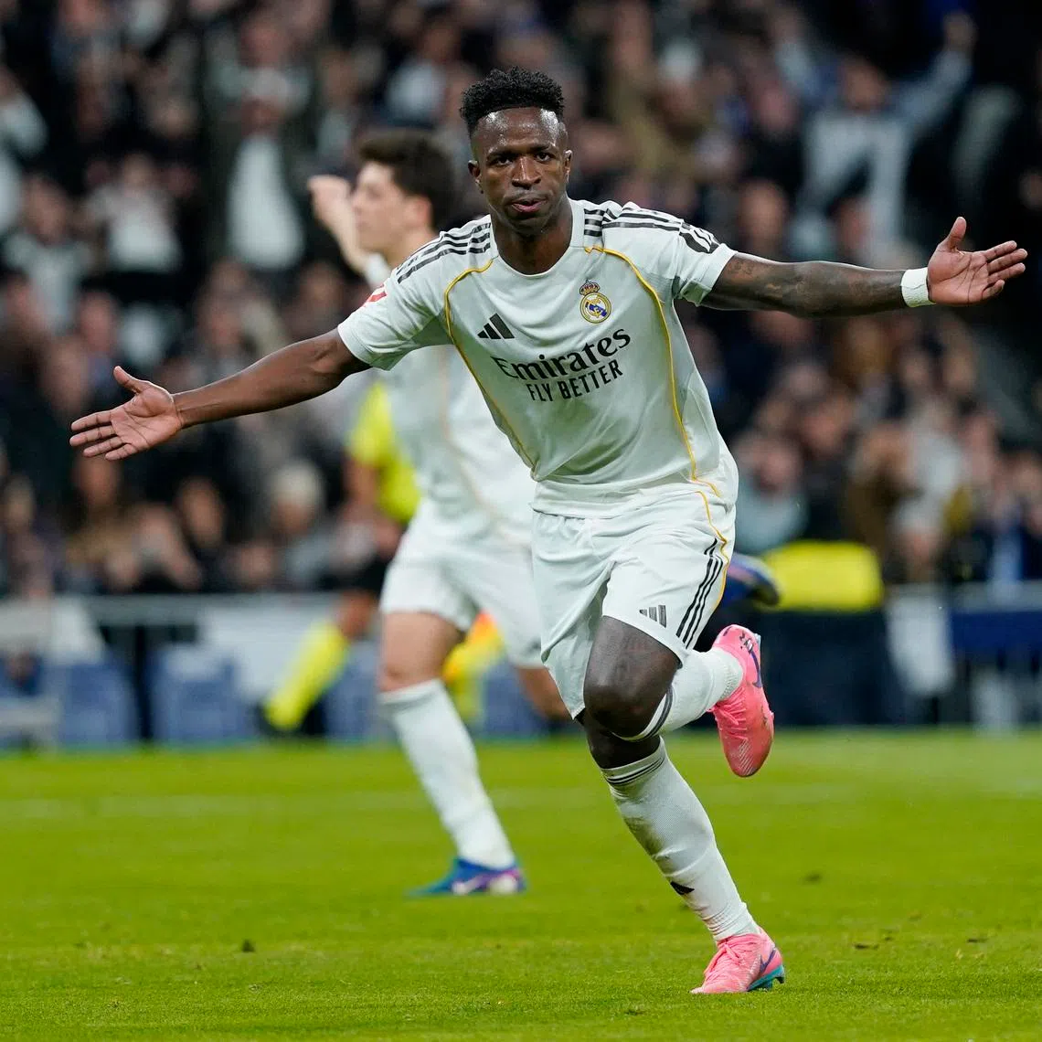 Soccer Football - LaLiga - Real Madrid v Real Sociedad - Santiago Bernabeu, Madrid, Spain - February 14, 2026 Real Madrid's Vinicius Junior celebrates scoring their second goal REUTERS/Ana Beltran