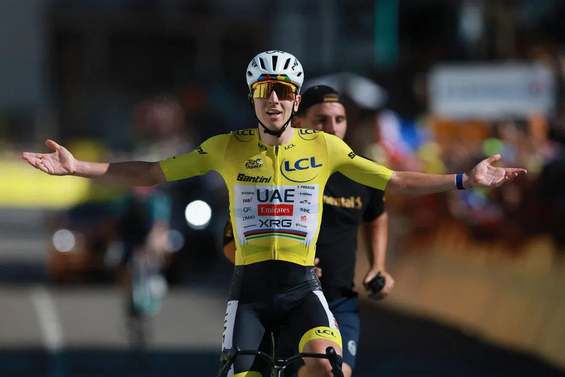 UAE Team Emirates XRG’s Tadej Pogacar celebrates winning Stage 19 of the Tour de France on July 24.