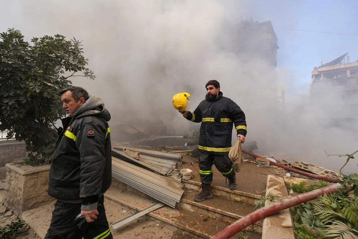 Emergency personnel work at the site of an Israeli strike on Beirut's southern suburbs, following an escalation between Hezbollah and Israel amid the U.S.-Israeli conflict with Iran, Lebanon, March 3, 2026. REUTERS/Stringer