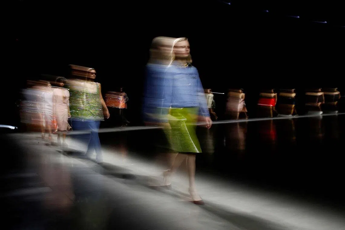 Models present creations at the Gucci Spring/Summer 2024 fashion show during Milan Fashion Week in Milan, Italy, Sept 22.