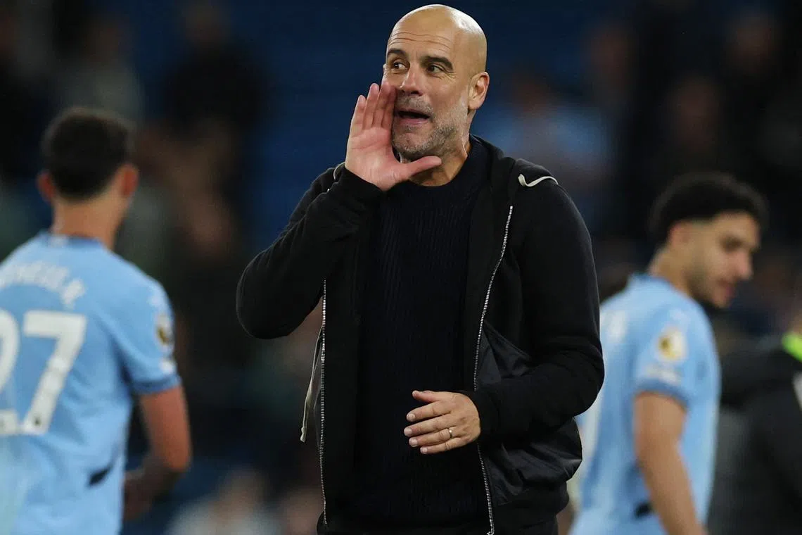 FILE PHOTO: Soccer Football - Premier League - Manchester City v Aston Villa - Etihad Stadium, Manchester, Britain - April 22, 2025 Manchester City manager Pep Guardiola celebrates after the match REUTERS/Phil Noble/File Photo