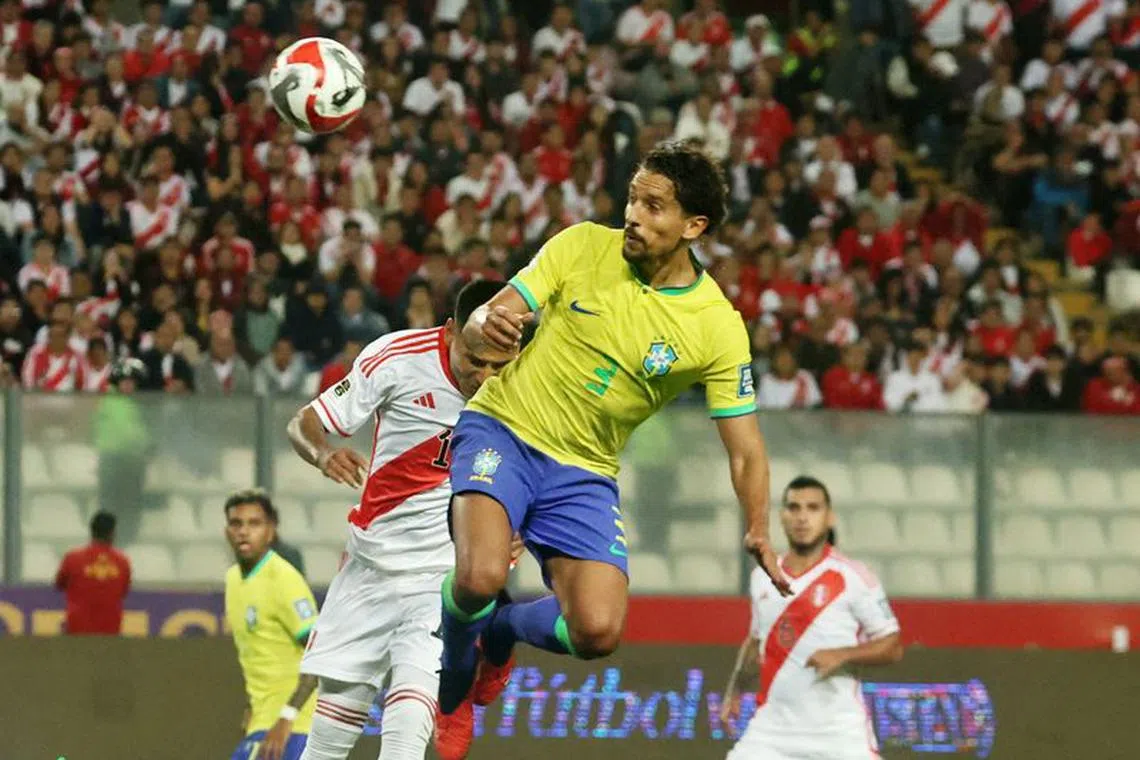 Soccer Football - World Cup - South American Qualifiers - Peru v Brazil - Estadio Nacional, Lima, Peru - September 12, 2023 Brazil's Marquinhos scores their first goal REUTERS/Sebastian Castaneda