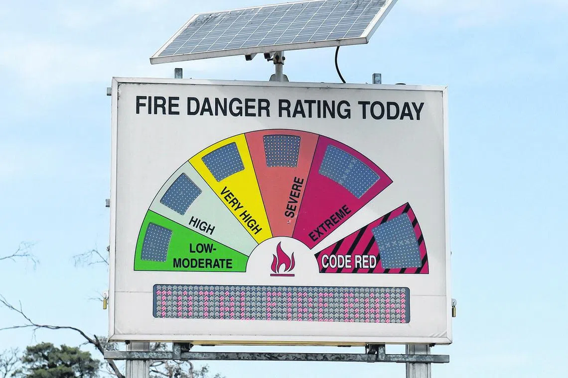 A roadside fire-danger sign signals severe and warns of a total fire ban in Melbourne, Australia, on Friday, Jan. 25, 2019. The world’s driest inhabited continent is in the grip of an extended heatwave, posting the hottest December on record, according to the Bureau of Meteorology. Bushfires are a constant threat, with much of Victoria and the island state of Tasmania under severe to extreme fire danger, the bureau said in a statement Wednesday. Photographer: Carla Gottgens/Bloomberg##########x##########