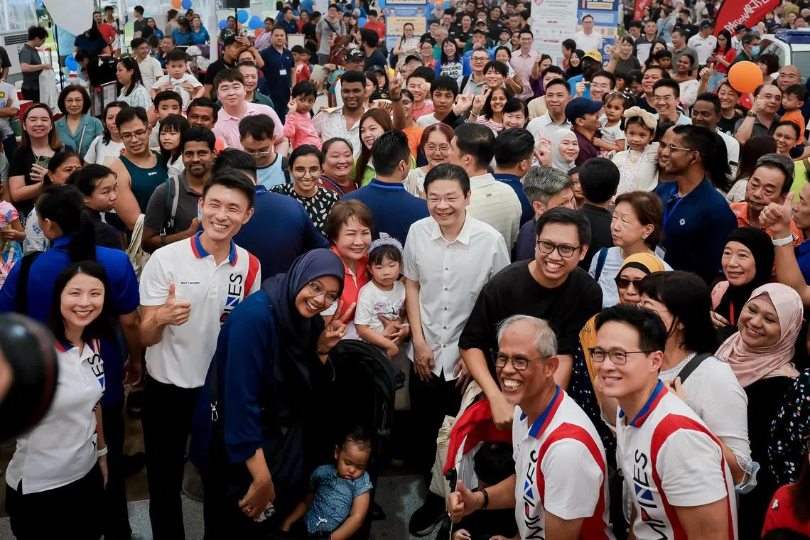 PM Lawrence Wong with residents at the Tampines Learning Festival 2024, held at Tampines Community Plaza on June 15.