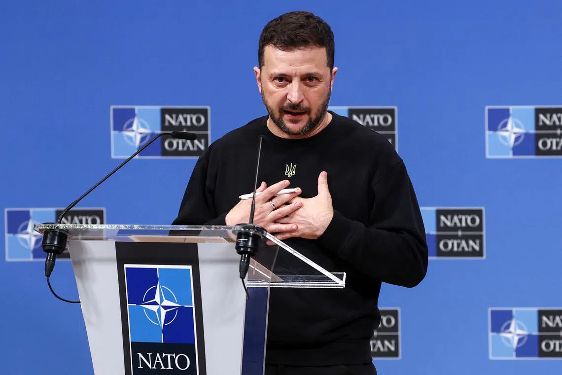Ukraine's President Volodymyr Zelenskiy attends a press conference, at the NATO headquarters in Brussels, Belgium October 17, 2024. REUTERS/Yves Herman