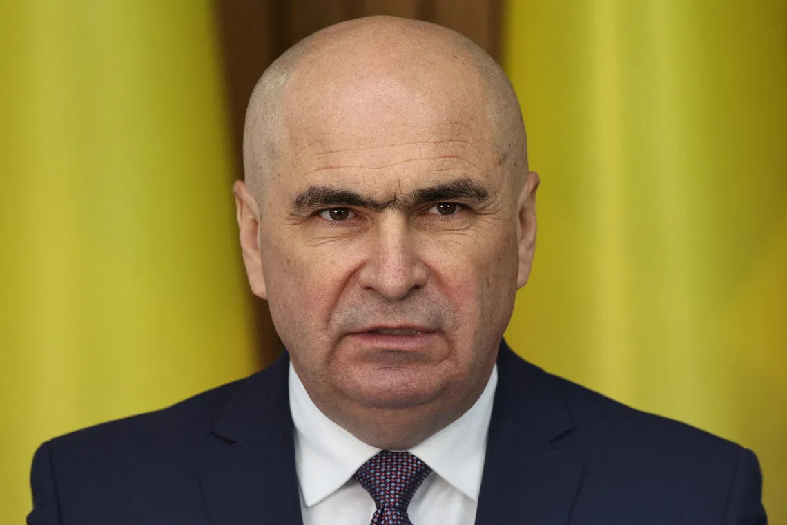 FILE PHOTO: Romanian Prime Minister Ilie Bolojan attends a press conference following talks with his Moldovan counterpart Dorin Recean in Chisinau, Moldova, August 23, 2025. REUTERS/Vladislav Culiomza/File Photo