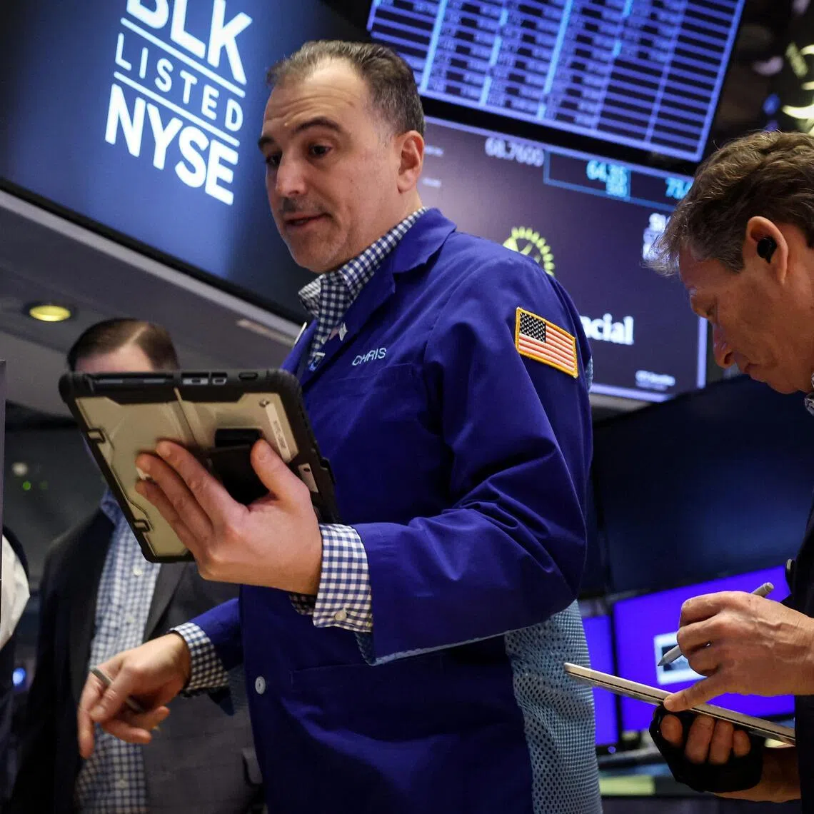 Traders working on the floor of the New York Stock Exchange, in New York City, on Feb 13.