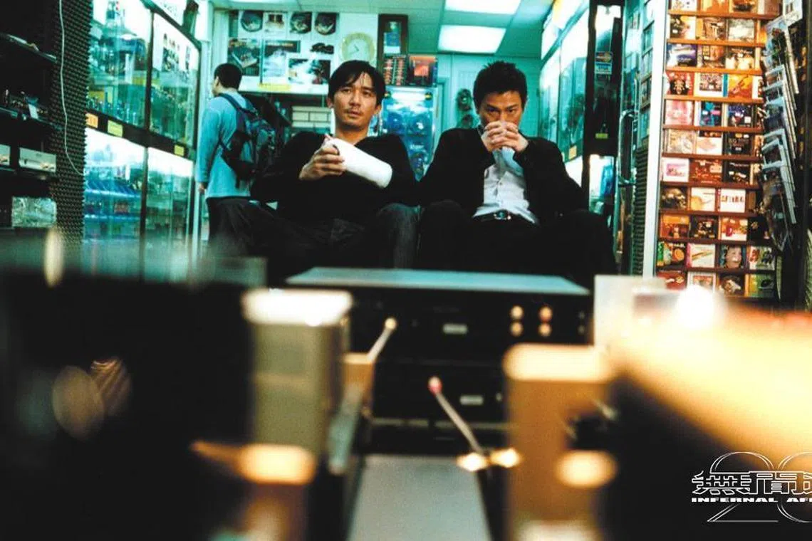 Tony Leung (left) and Andy Lau kicked off the Infernal Affairs trilogy in 2002.