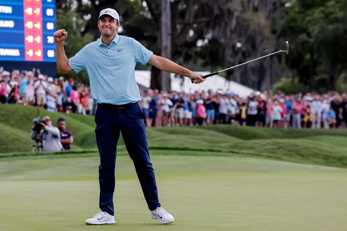 Scottie Scheffler reacting after sinking his final putt on the 18th hole to win The Players Championship at TPC Sawgrass in Ponte Vedra Beach, Florida.