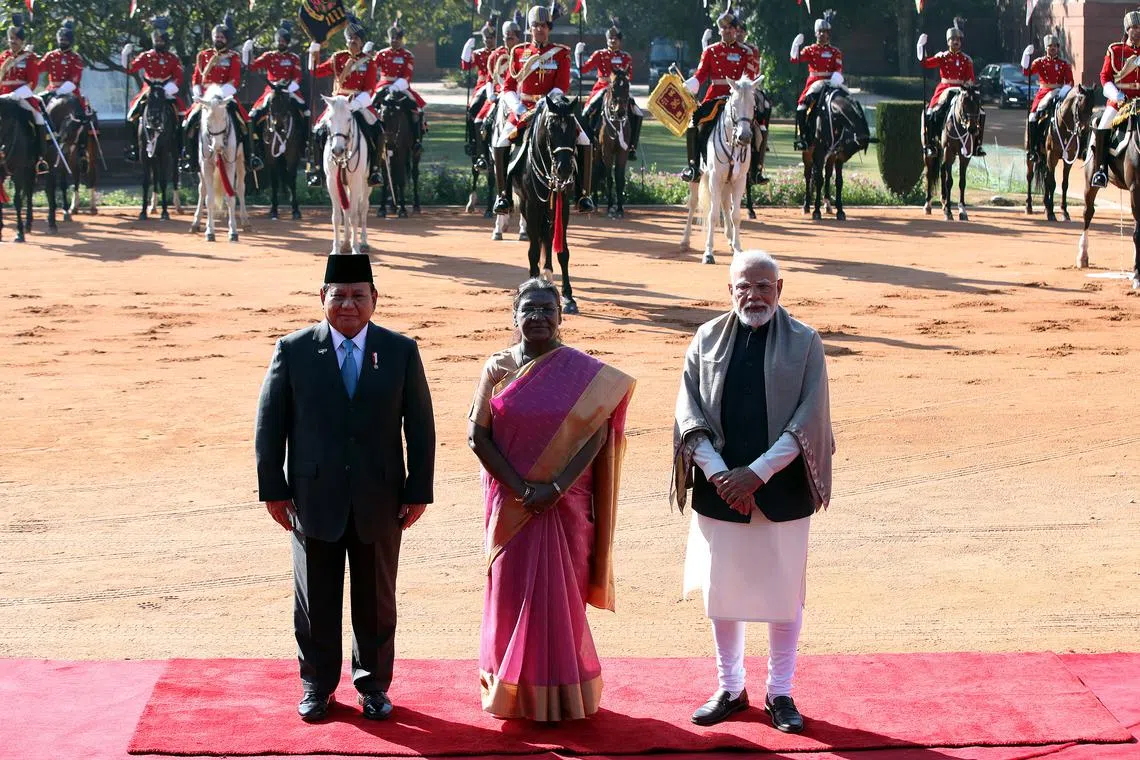 (From left) Indonesia’s President Prabowo Subianto with Indian President Droupadi Murmu and PM Narendra Modi at the President's House in New Delhi, on Jan 25.