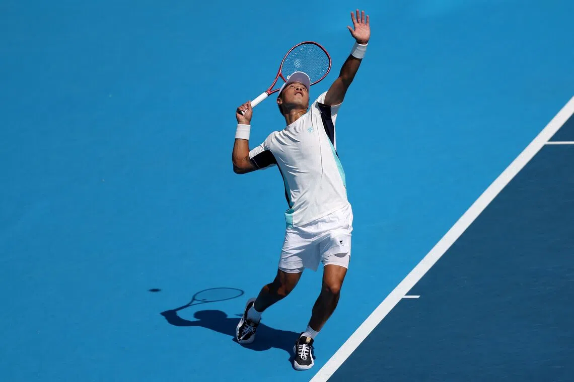 Brandon Nakashima in action against Daniil Medvedev.