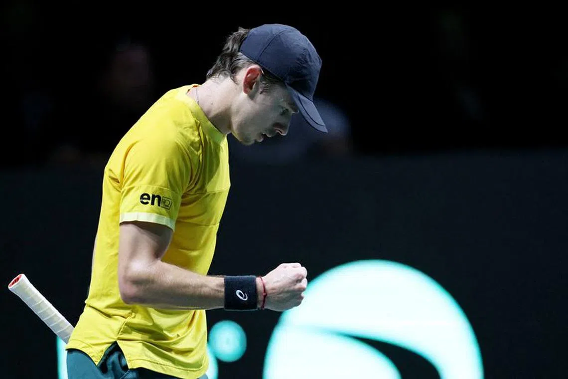 Tennis - Davis Cup - Final - Australia v Italy - Palacio de deportes Martin Carpena, Malaga, Spain - November 26, 2023 Australia's Alex de Minaur reacts during his singles match against Italy's Jannik Sinner REUTERS/Violeta Santos Moura