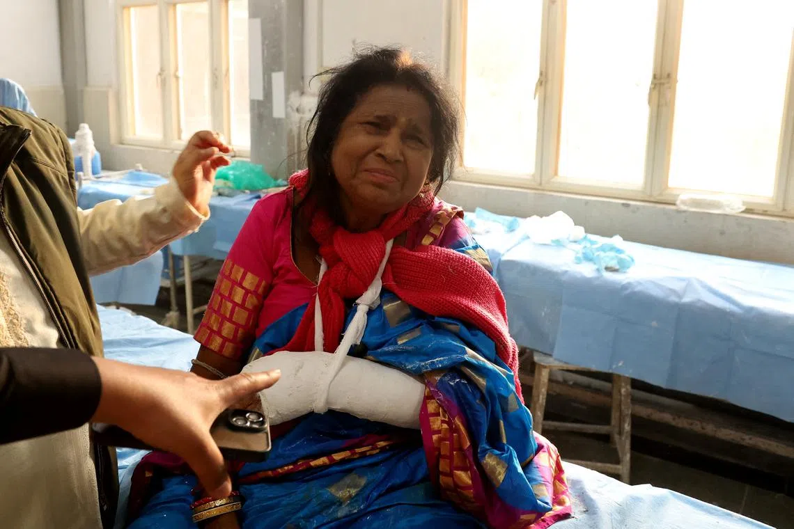 A woman, who was injured in a suspected militant attack near scenic Pahalgam, receives treatment in a hospital in south Kashmir’s Anantnag April 22, 2025 REUTERS/Stringer