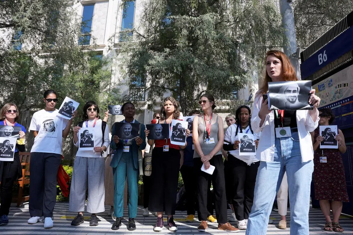 FILE PHOTO: Human rights advocates protest in solidarity with political prisoners in Egypt and United Arab Emirates on the sidelines of the United Nations Climate Change Conference COP28 in Dubai, United Arab Emirates, December 9, 2023. REUTERS/Stringer/File Photo