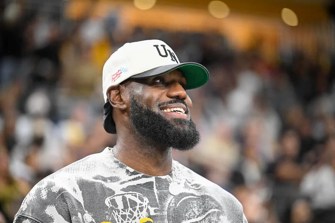 LeBron James looks on during the first half of a game between the Phoenix Suns and the Los Angeles Lakers at Acrisure Arena. 