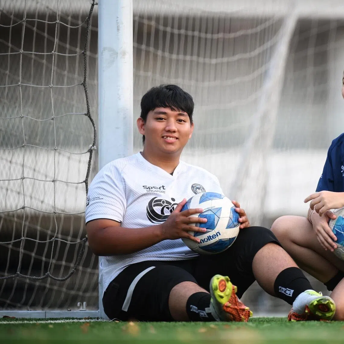 ST20251018_202581600412 dlheartsleague Chong Jun Liang
From left: Muhammad Arfa Yazmi, 20 and Fajriyah Binte Mohamed Farid, 20 from the SportsCare HEARTS Football League on Oct 18, 2025.
