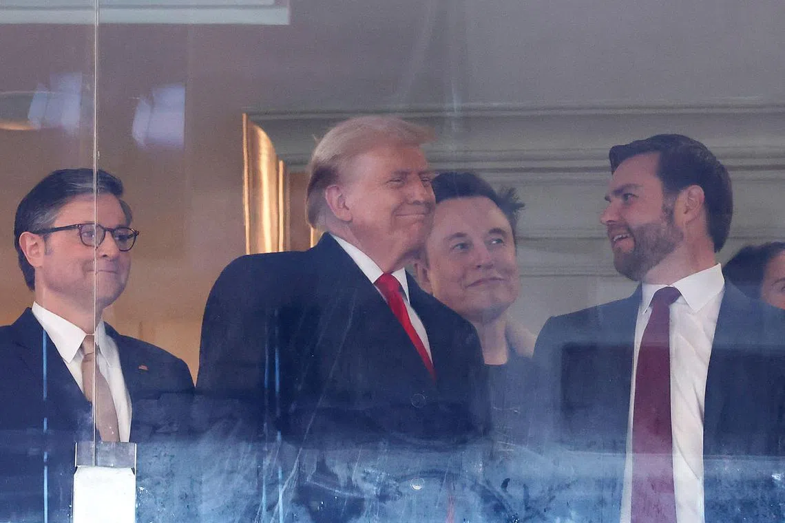 (From left) Speaker of the House Mike Johnson, US President-elect Donald Trump, Tesla CEO Elon Musk and Vice-President-elect JD Vance attending a football game in Maryland, on Dec 14.
