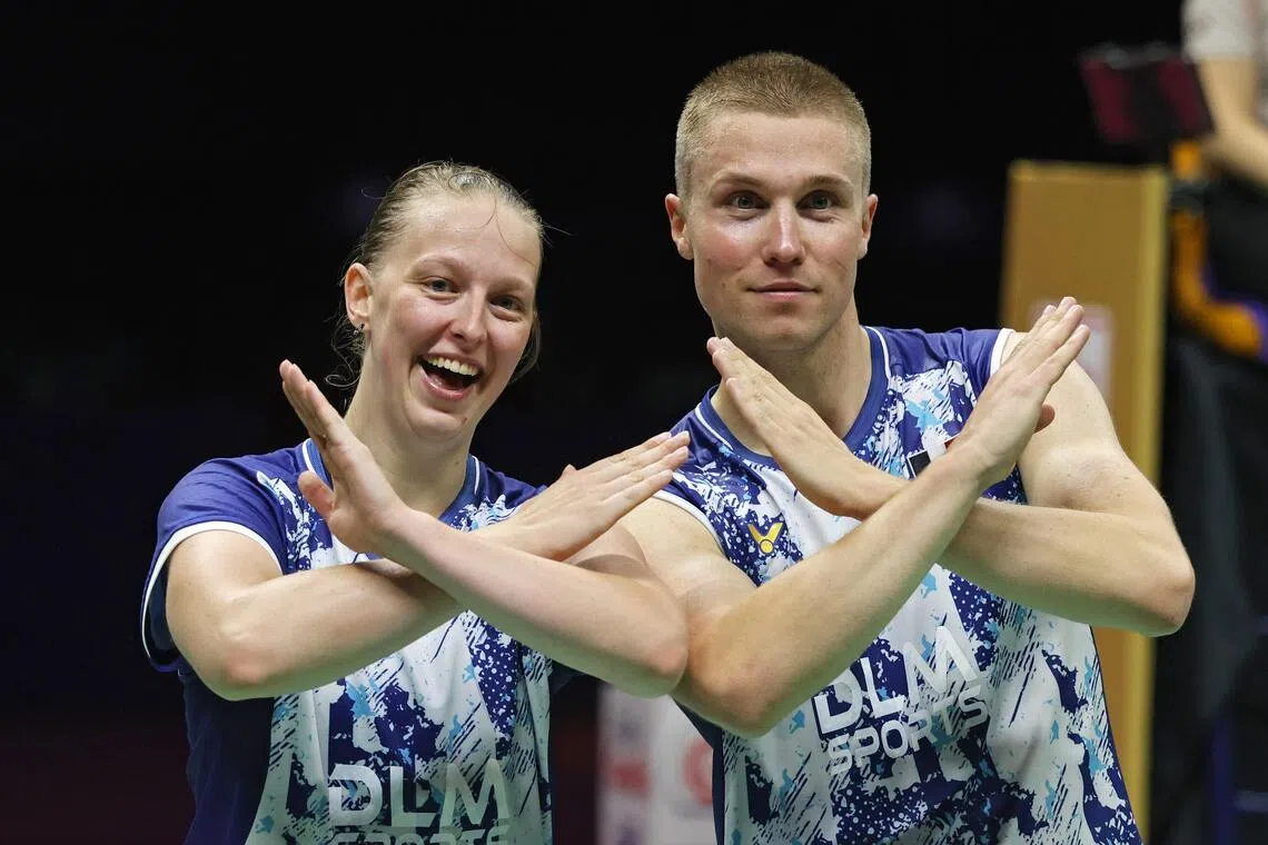 Thom Gicquel (right) and Delphine Delrue after winning the mixed doubles title on Aug 23.