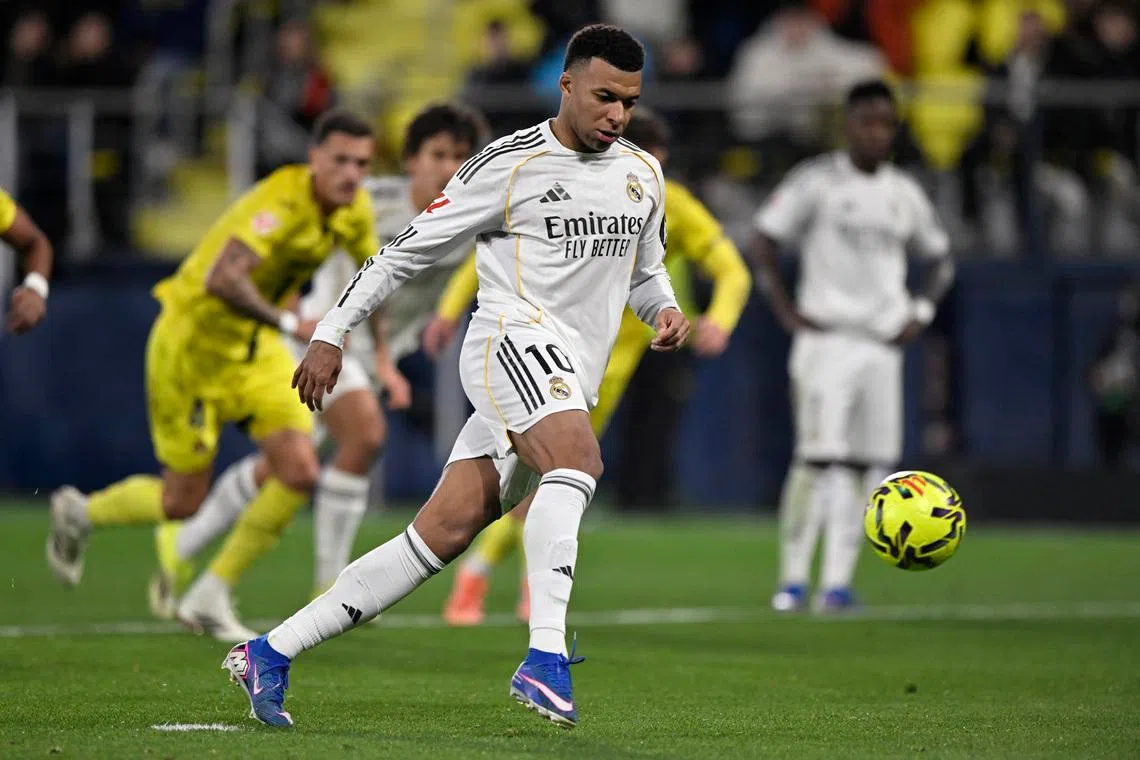 Soccer Football - LaLiga - Villarreal v Real Madrid - Estadio de la Ceramica, Villarreal, Spain - January 24, 2026 Real Madrid's Kylian Mbappe scores their second goal from the penalty spot REUTERS/Pablo Morano