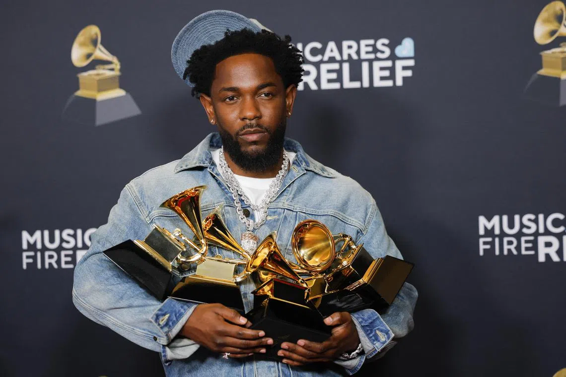 Kendrick Lamar, winner of the Record Of The Year, Best Rap Performance, Best Rap Song, Best Music Video, and Song Of The Year awards, poses in the press room during the 67th Annual Grammy Awards in Los Angeles on Feb 2.