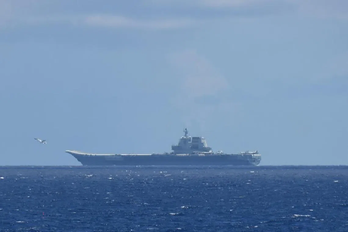 The Chinese aircraft carrier Shandong was seen passing through waters separating Taiwan and the Philippines on July 10.