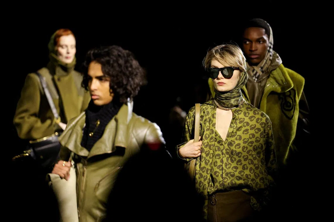 Models present creations at the Burberry catwalk show during London Fashion Week in London, Britain, February 19, 2024. REUTERS/Hollie Adams     TPX IMAGES OF THE DAY     