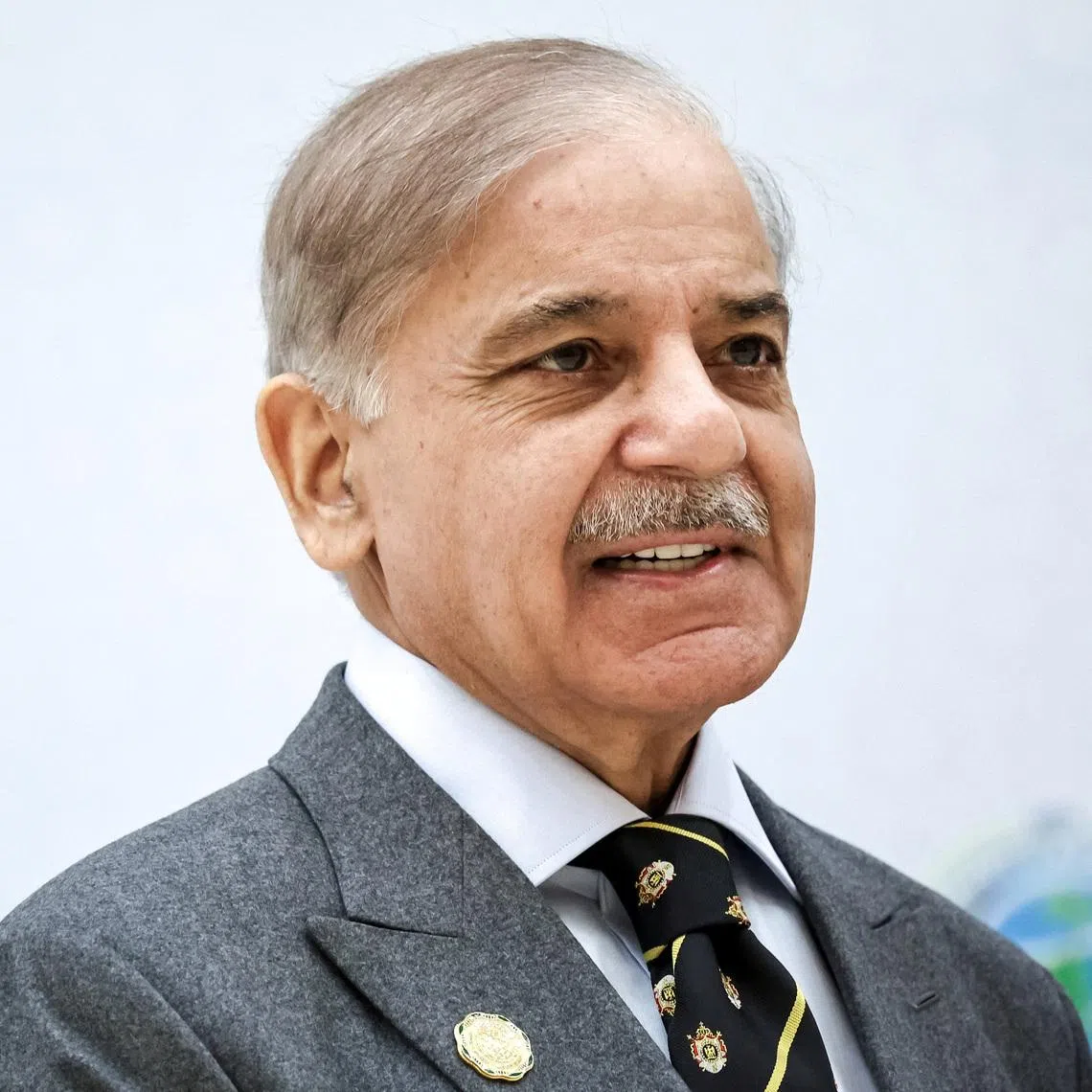 FILE PHOTO: Pakistani Prime Minister Shehbaz Sharif arrives to attend a plenary session of the International Forum dedicated to the International Year of Peace and Trust, the International Day of Neutrality, and the 30th anniversary of Turkmenistan's neutrality status, at the Congress Centre in Ashgabat, Turkmenistan December 12, 2025. Sputnik/Alexander Kazakov/Pool via REUTERS/File Photo