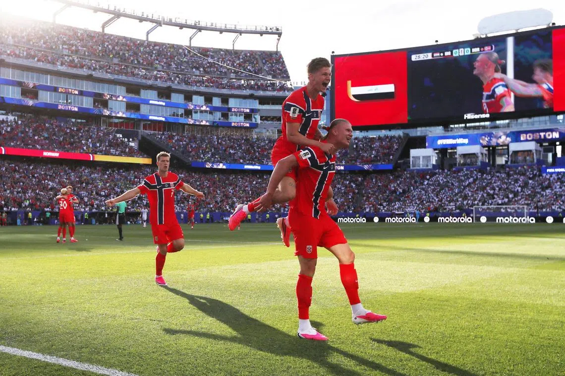 Soccer Football - FIFA World Cup 2026 - Group I - Iraq v Norway - Boston Stadium, Foxborough, Massachusetts, U.S. - June 16, 2026 Norway's Erling Haaland celebrates scoring their first goal with Alexander Sorloth and David Moller Wolfe IMAGN IMAGES via Reuters/Paul Rutherford     TPX IMAGES OF THE DAY